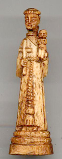 Santo Antônio. Imagem atribuída a Dito Pituba (1848-1923). Chifre, 8cm. Clique para ampliar.